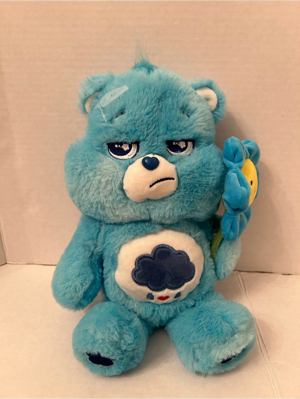 Care Bears Blue Grumpy Bear with flower Plush